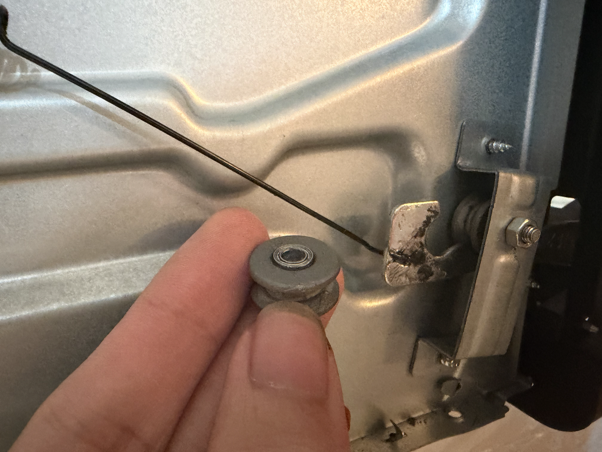 The stainless steel roller installed, with another one on standby.